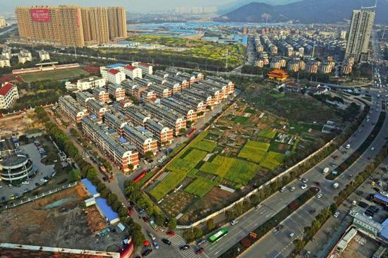 外媒称中国推进城市化需寻找新“工具”：农民工不愿离家